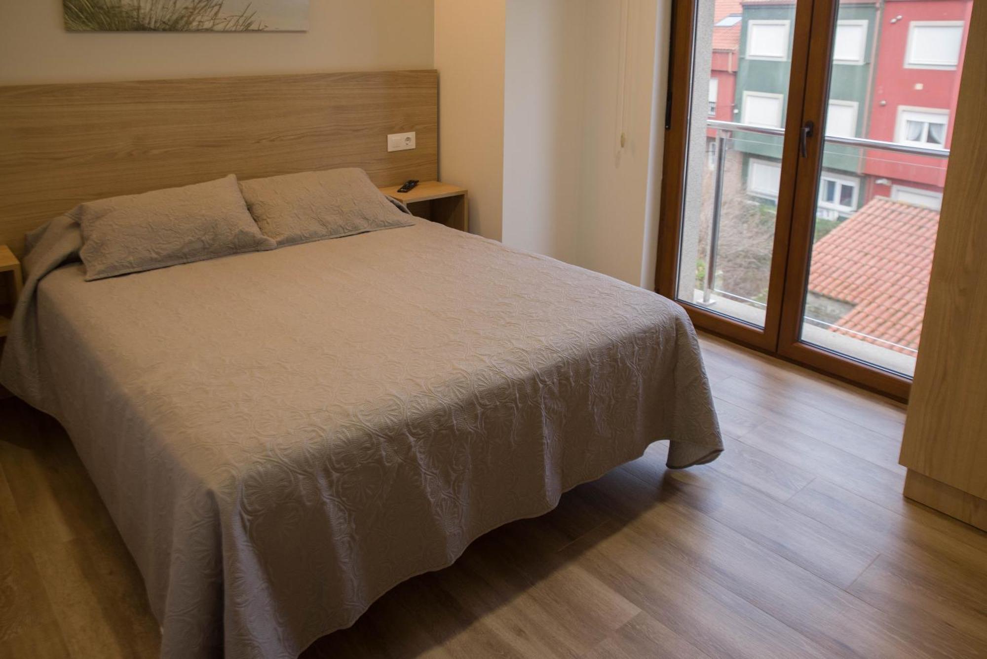 Apartamentos Turisticos Haz Amigo Muxía Quarto foto